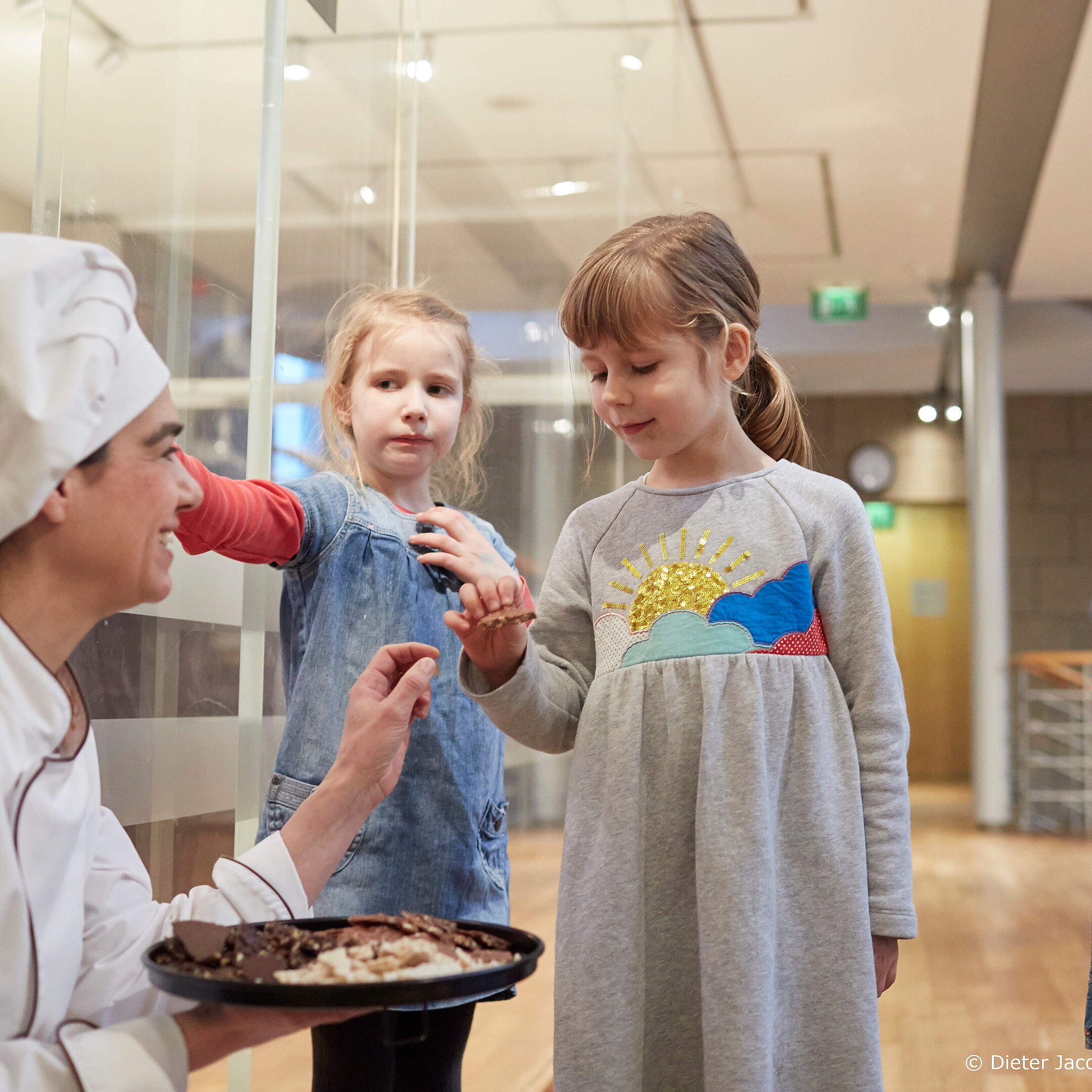 Chocolate Museum Children tasting sweets with baker or pastry chef