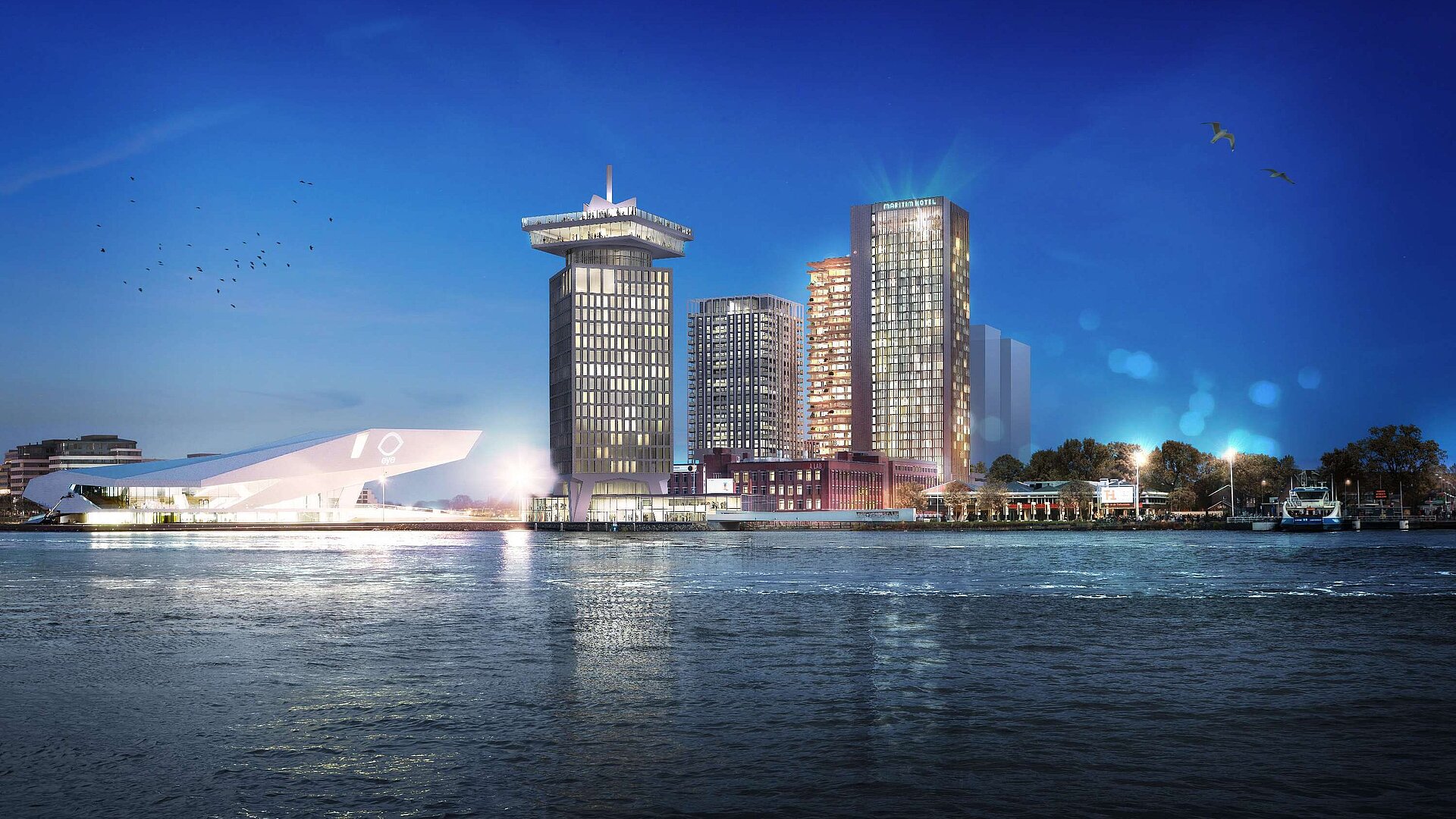 Maritim Hotel Amsterdam at night with skyline view and the IJ river