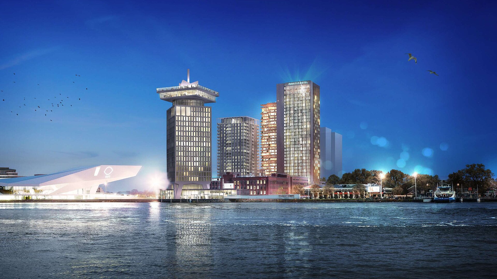 Maritim Hotel Amsterdam at night with skyline view and the IJ river