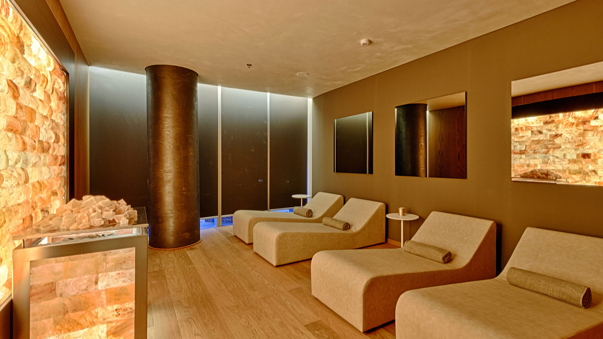 Spa Relaxation room with heated loungers and salt wall at Oblivion Spa, Maritim Hotel Plaza Tirana