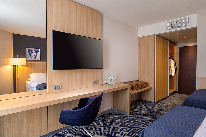 Habitación Comfort Twin Habitación Comfort Twin en el Maritim Hotel Würzburg con escritorio y diseño moderno