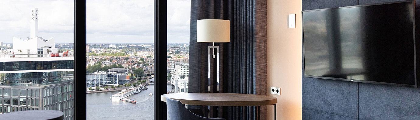Seating area view Seating area with table and view over Amsterdam in Maritim Hotel Amsterdam