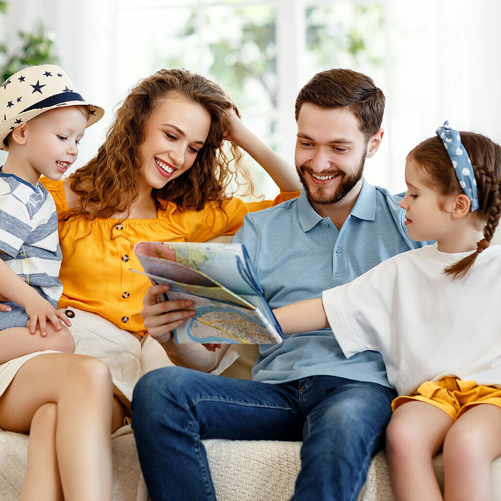 Happy family planning holiday together at home
