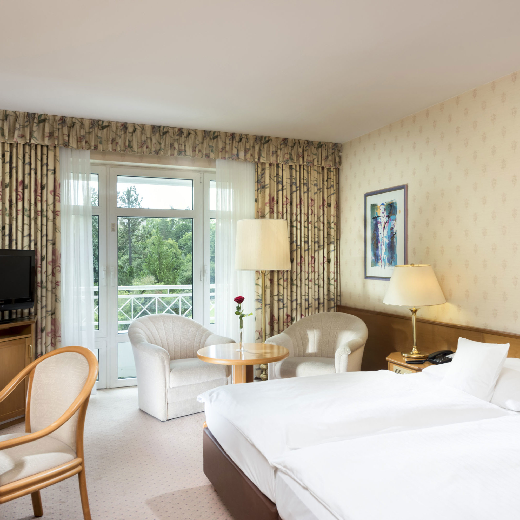 Comfort room Bright double room with balcony view and seating area at Maritim Hotel Bad Wildungen
