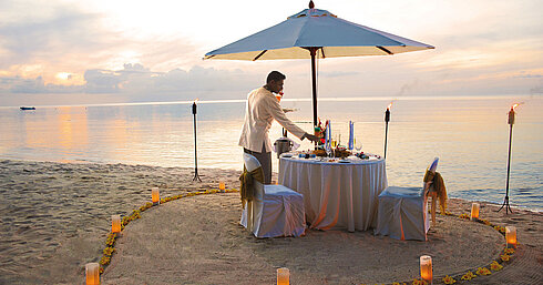 Romantic beach dinner at sunset at Maritim Hotel Mauritius