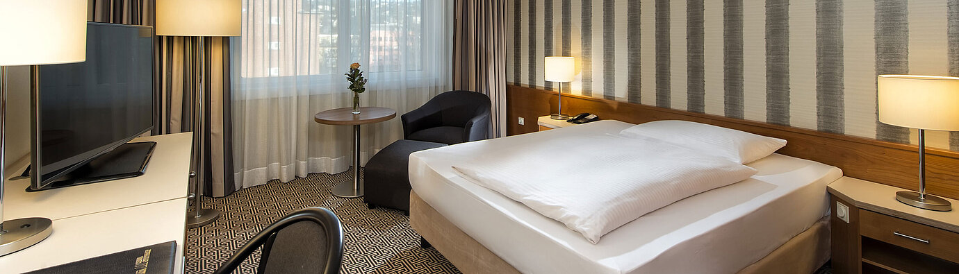 Chambre Classic Comfort Chambre individuelle moderne avec vue sur la ville à l’hôtel Maritim Stuttgart