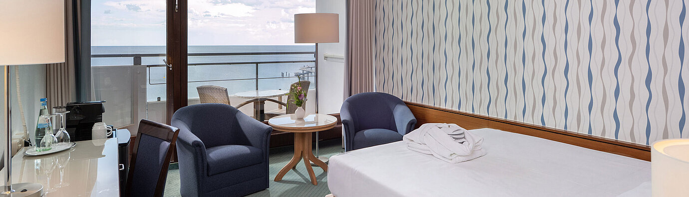 Superior Queen room Superior Queen room with queen-size bed, seating area and large window with a view