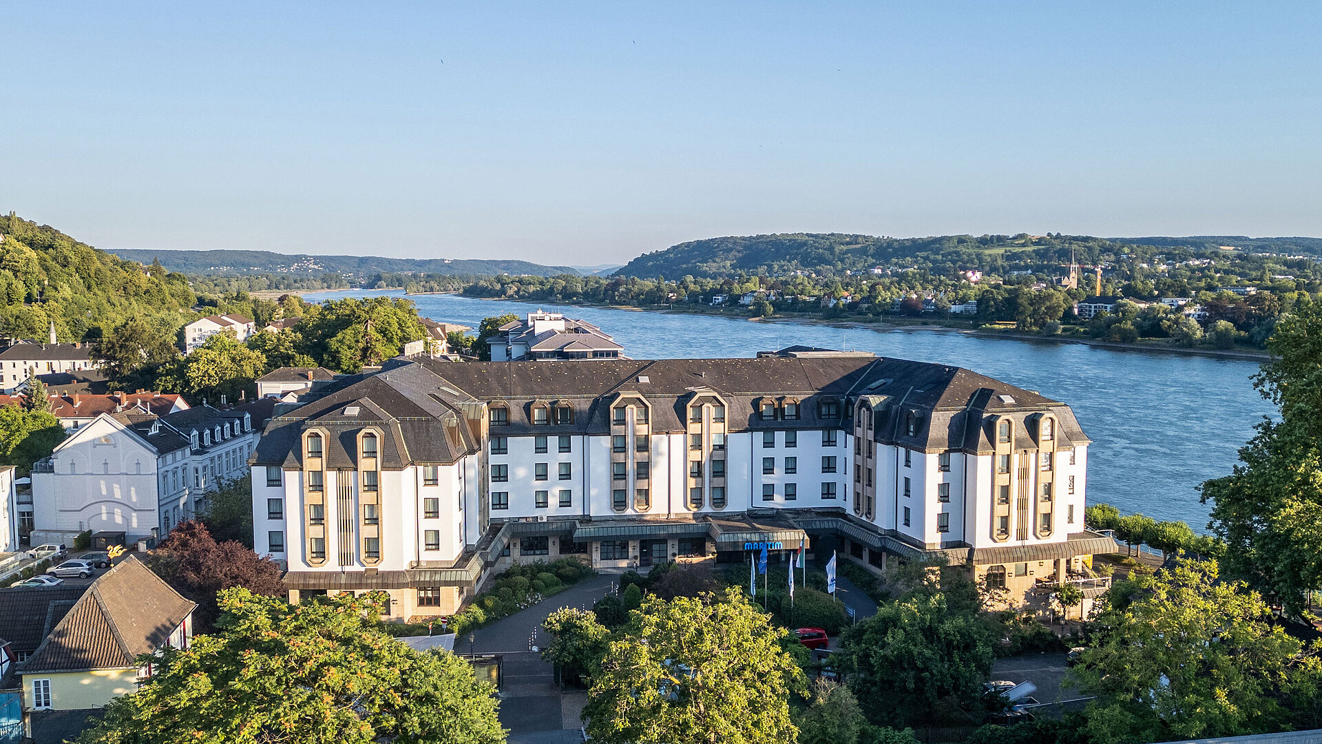 Exterior view of Maritim Hotel Königswinter overlooking the River Rhine, the Rhine Valley and surrounding vineyards.
