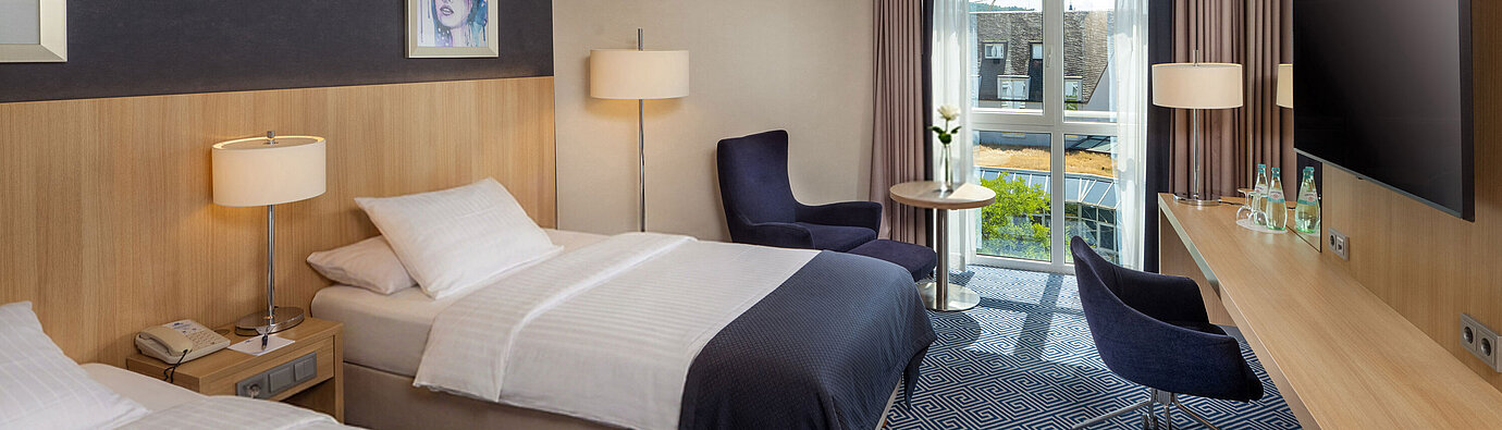 Habitación Comfort Twin Habitación Comfort Twin en el Maritim Hotel Würzburg con balcón y confort moderno