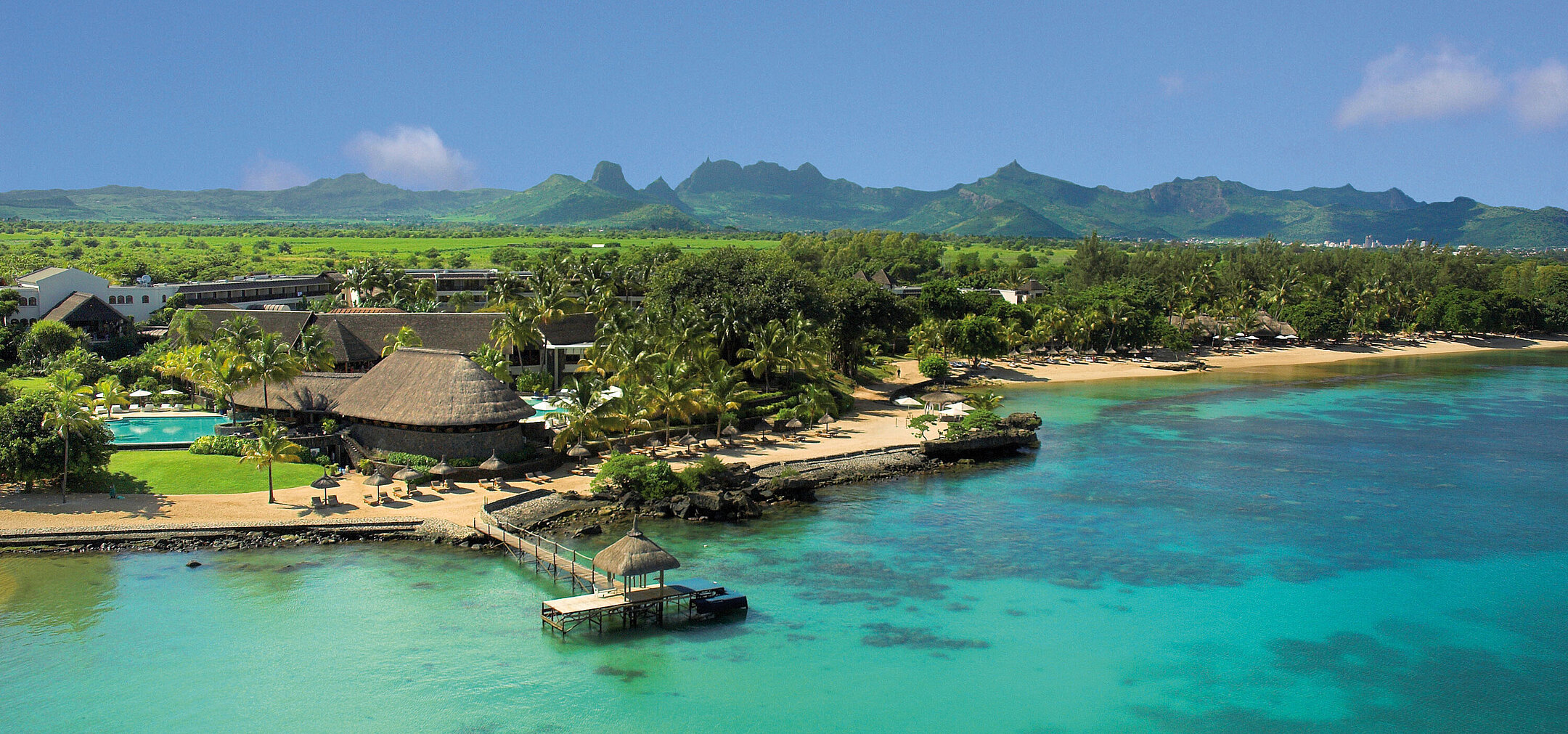 Aerial view of Maritim Hotel Mauritius with beach, lagoon and tropical landscape