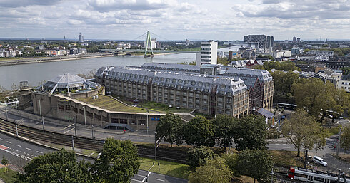 Exterior view Aerial view of the Maritim Hotel Cologne, featuring the Rhine River, Severins Bridge, and surrounding buildings.
