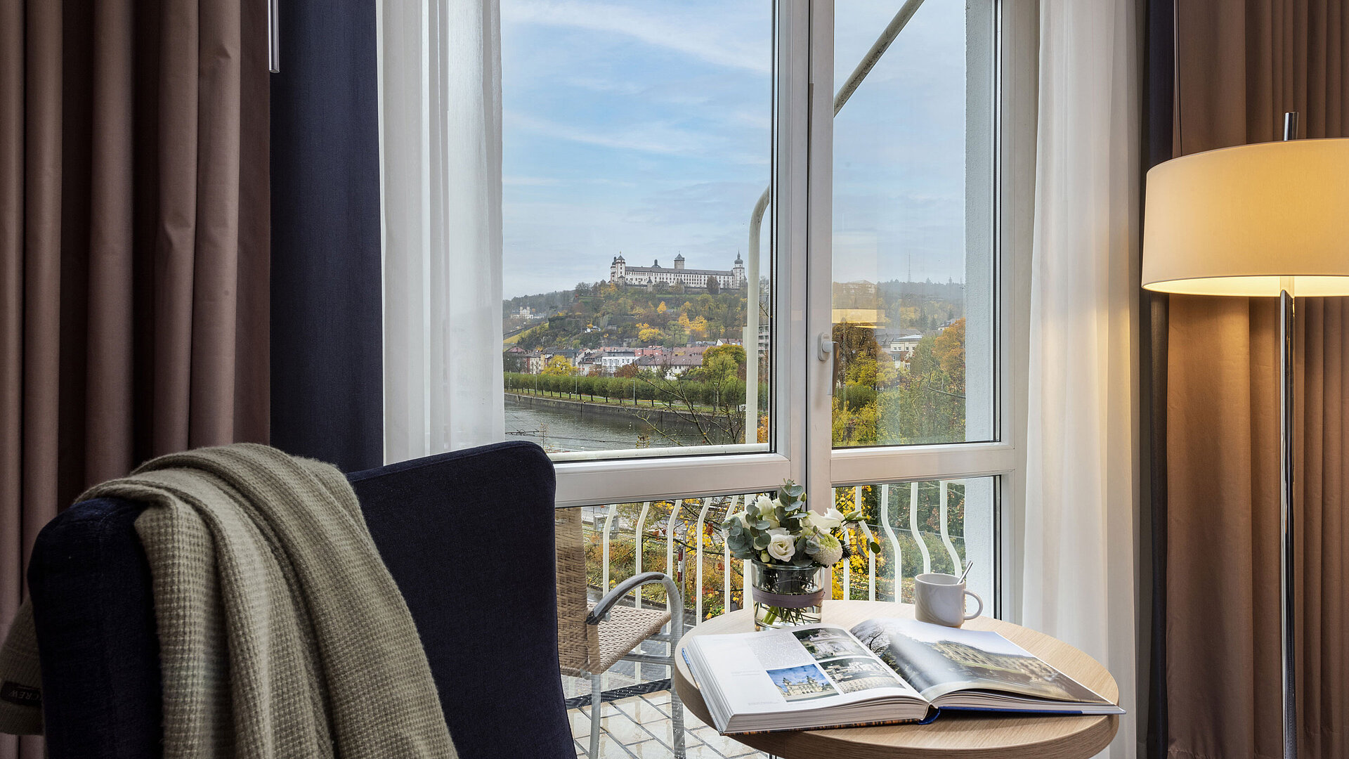 Comfortable Superior Room at Maritim Hotel Würzburg with a panoramic view of Marienberg Fortress
